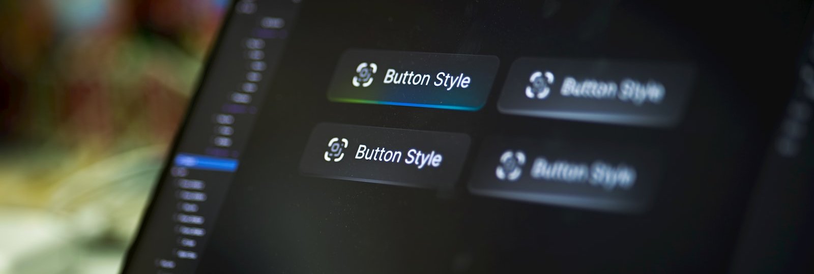UI button styles examined closely on a laptop screen
